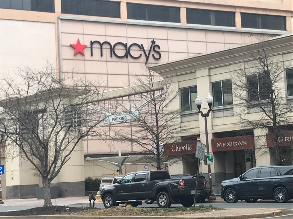 This is all that remains of where Hechts used to put various messages up.  It became a Macys and only the concrete squares suggest the old signage - and its quite obscured by a building with a tower where the front parking lot used to be!